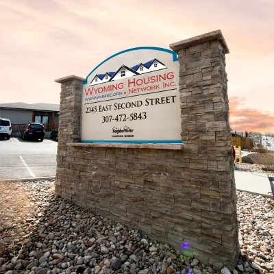 Wyoming Housing Network Casper sign with address and phone number Wyoming Housing Network Casper sign with address and phone number