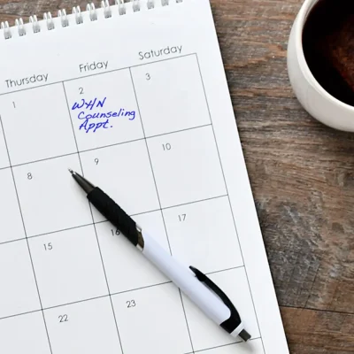 WHN_Home_Schedule_Appointment_202603 A calendar with WHN Counseling Appointment written on it.